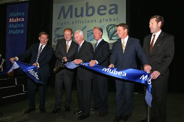 Mubea North America expanded its Northern Kentucky operations in 2013 with (L-R) CEO Doug Cain, General Partner Thomas Muhr, Gov. Steve Beshear, Gary Moore, Steve Pendery and Steve Stevens