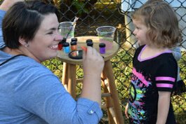 A rebuilt Peaselburg Park was dedicated with a day of activities including face painting.