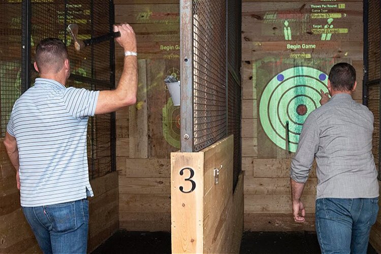 Ax-throwing at Full Throttle in Florence is one way to handle pandemic-related stress.