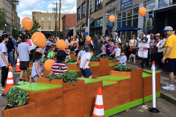 One of five Curb'd street installations offers hopscotch and seating in front of Braxton Brewing