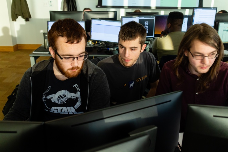 In the JRG Cyber Threat Intelligence Lab are Zeb Gentry, Bradley Hatting and Justin Flynn.