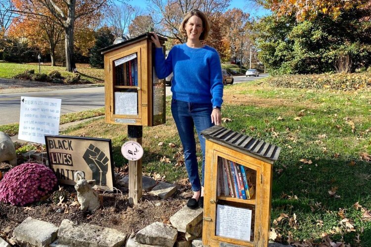 Maggie Gieseke shows off her libraries in Hyde Park: The Big Pig Little Free Library for adults and The Big Pig Little Free Children's Library with books only for kids. She’s committed to stocking books by diverse authors. Charter #900