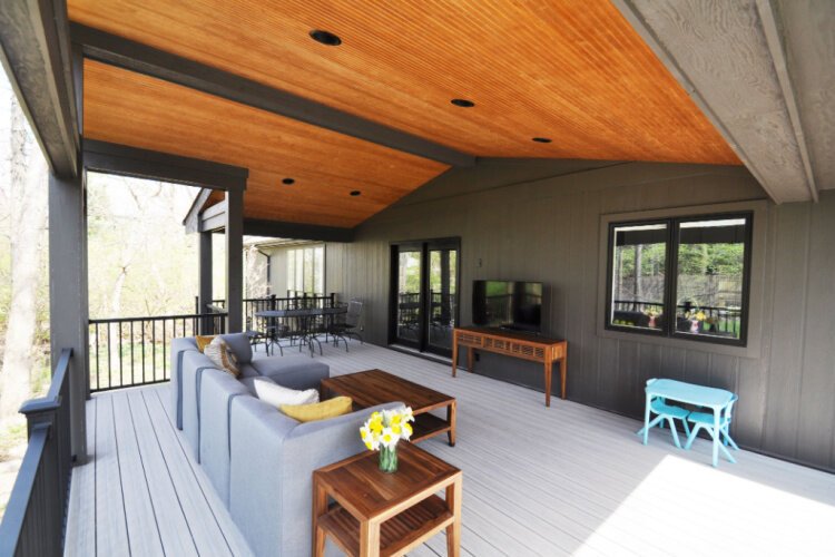 A covered deck designed by SKL Architecture.