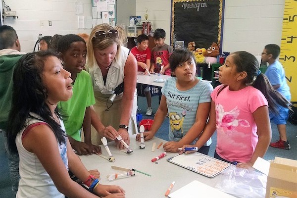 Stacie Strotman with students on Summer Learning Day.