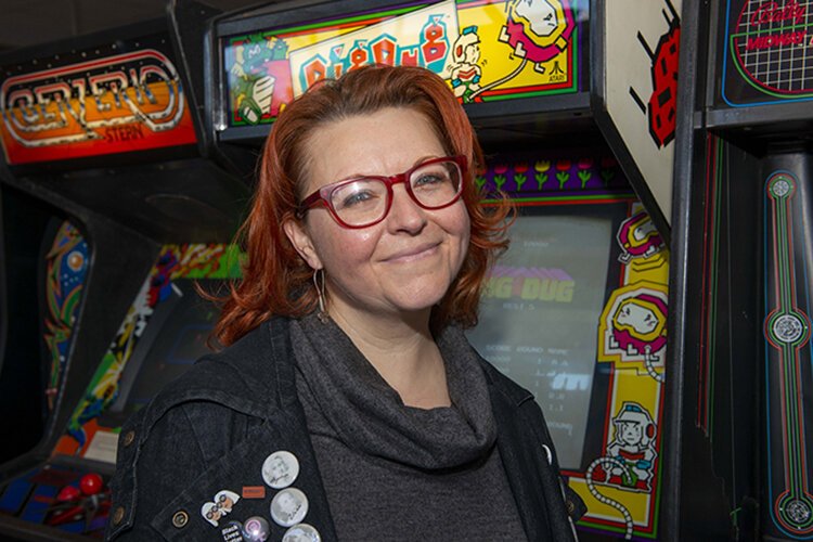 Leslie Rich, Westwood Works director, at the soon-to-be-opened retro arcade she and her husband own.