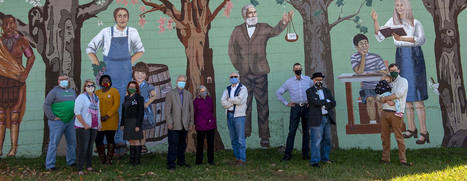 Westwood community organizers in front of the mural that started it all: John Eby, Jess Thayer, Portia Schandorf, Leslie Rich, Greg Kissel, Liz Kissel, Bill Fussinger, Dan Owens, Greg Hand, and Tom Sauter.