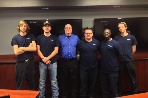 Mubea's first class of apprentices with the company's Drew Farris (light blue shirt)